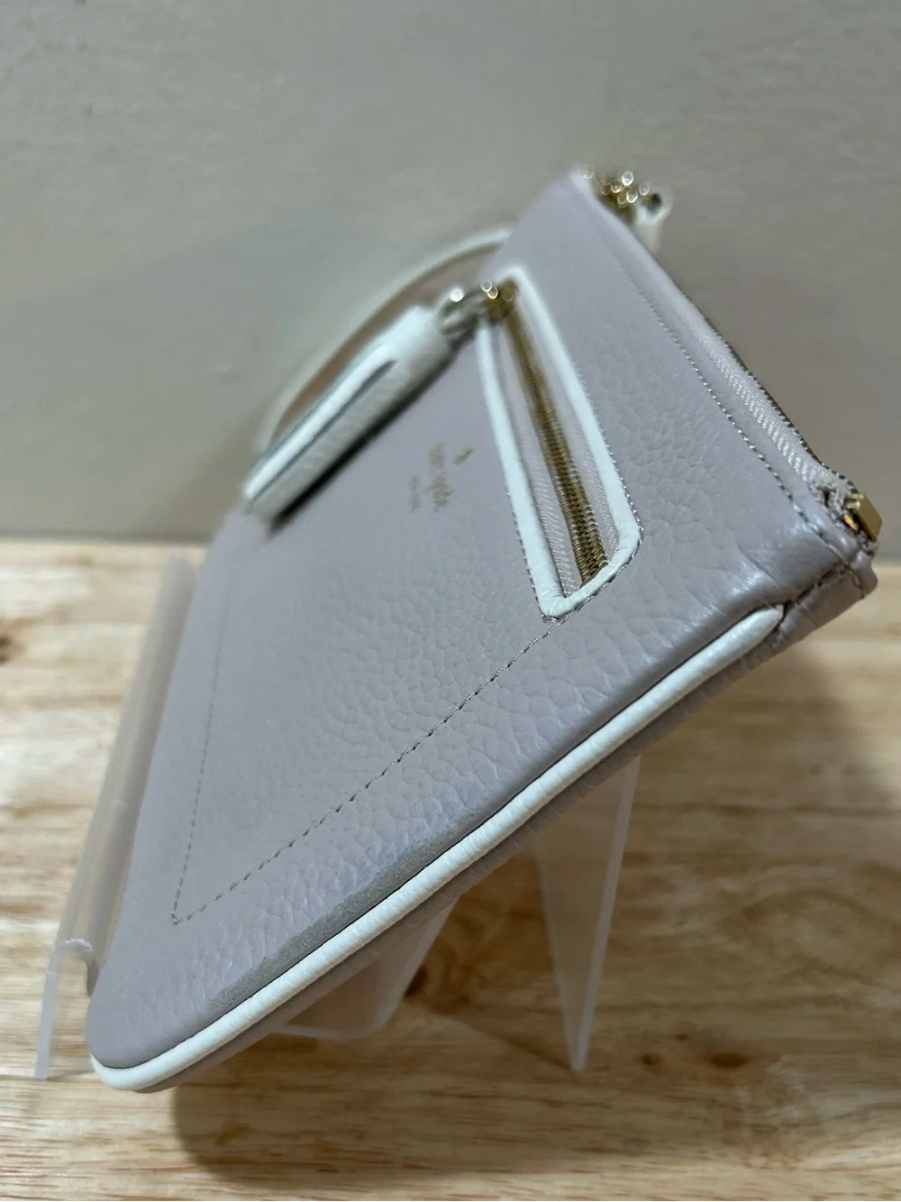 kate spade pebbled leather wristlet in light taupe with beige trim